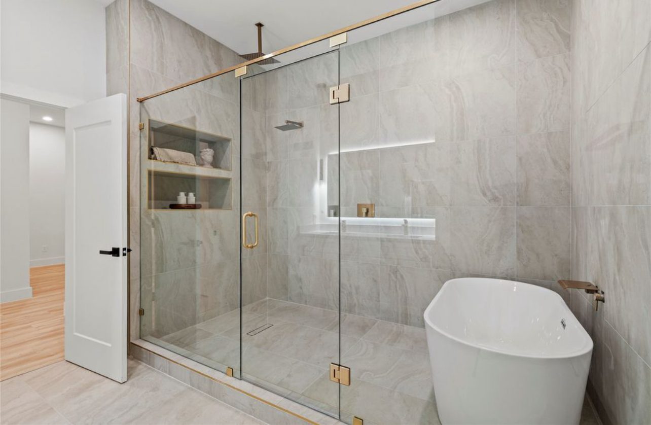 Luxury Master Bath with Shower and Freestanding Tub