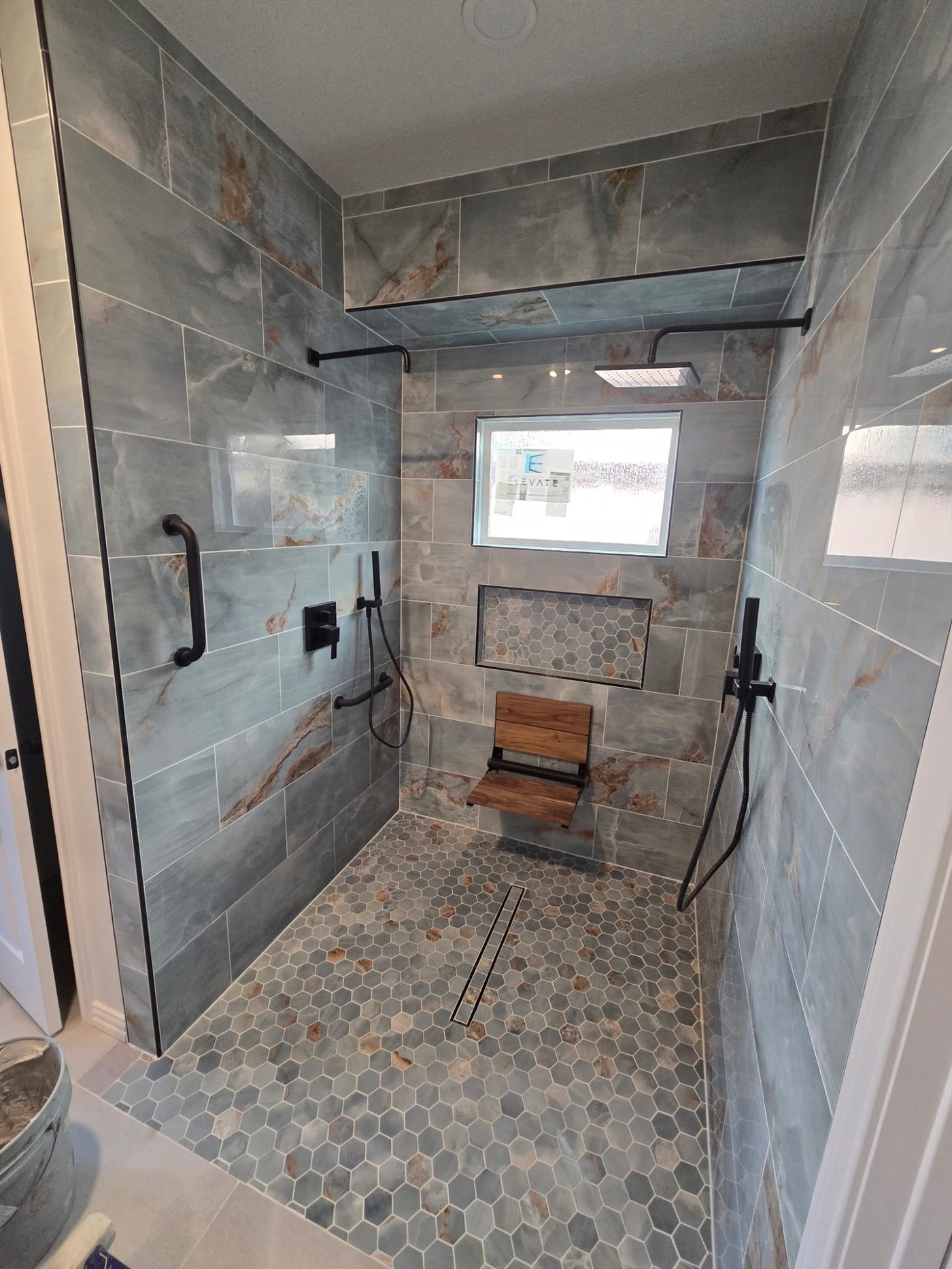 Walk-In Shower Hex Floor and Teak Bench
